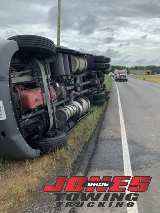 Rolled-over Semi needs towing company